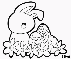 Colorear Conejo entre flores y huevos de Pascua