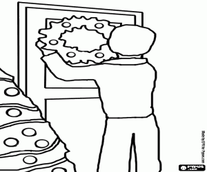 Colorear Hombre colgando la corona de Navidad en la puerta de su casa