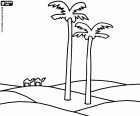 Palmeras en las dunas del desierto con camellos a lo lejos