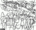 Ash y sus amigos paseando con Pikachu por el bosque
