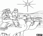 Los Reyes Magos con sus camellos llegando a Belén tras seguir la Estrella de Navidad
