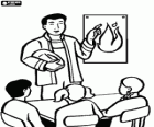 Bombero explicando como actuar en caso de incendio en una escuela 