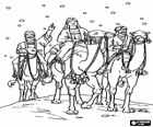 Los tres Reyes de Oriente a lomos de sus camellos en una noche estrellada