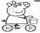 Peppa Pig montando su bicicleta