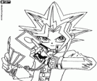 Yugi con las cartas del juego Duelos de Monstruos. Yu-Gi-Oh