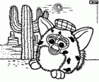 Un Furby y un cactus en el desierto con las montañas al fondo