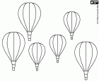 Los festivales de globos aerostáticos son grandes espectáculos visuales. Los colores y las formas de los globos en el cielo sobrevolando los más diversos paisajes