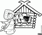 Una muchacha y una casita, típicas en Rusia