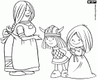 Ylva con su hijo Vicky y la niña Ylva. Ellos son tres personajes de Vicky el vikingo